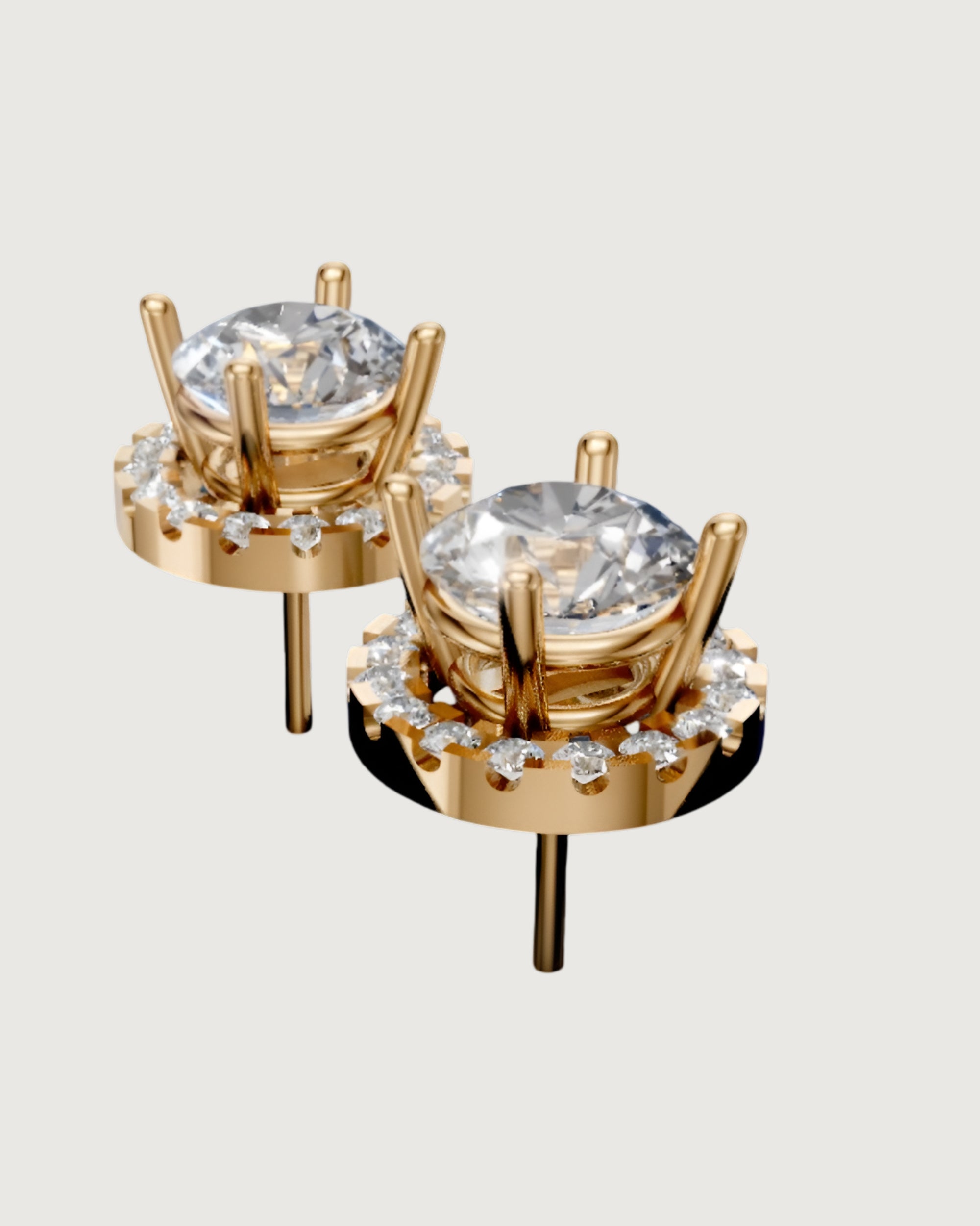 Classic Halo Solitaire Stud Earrings in Yellow Gold | Round Brilliant Center with Diamond Accents
