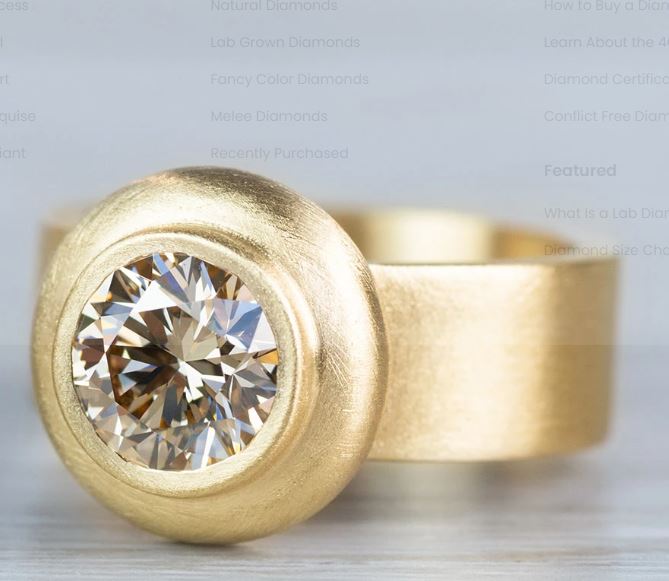 Golden Orbit Bezel-Set Ring – Sleek Radiance Collection