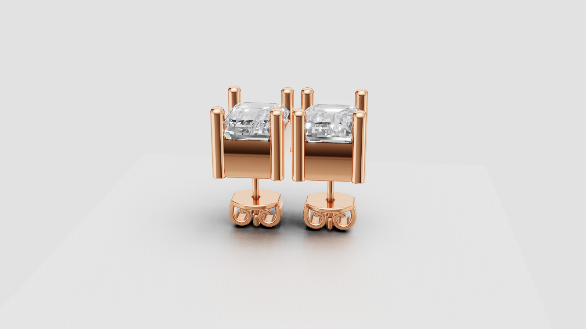 Emerald-Cut 4-Prong Stud Earrings | 18K Gold | DS IMPEX