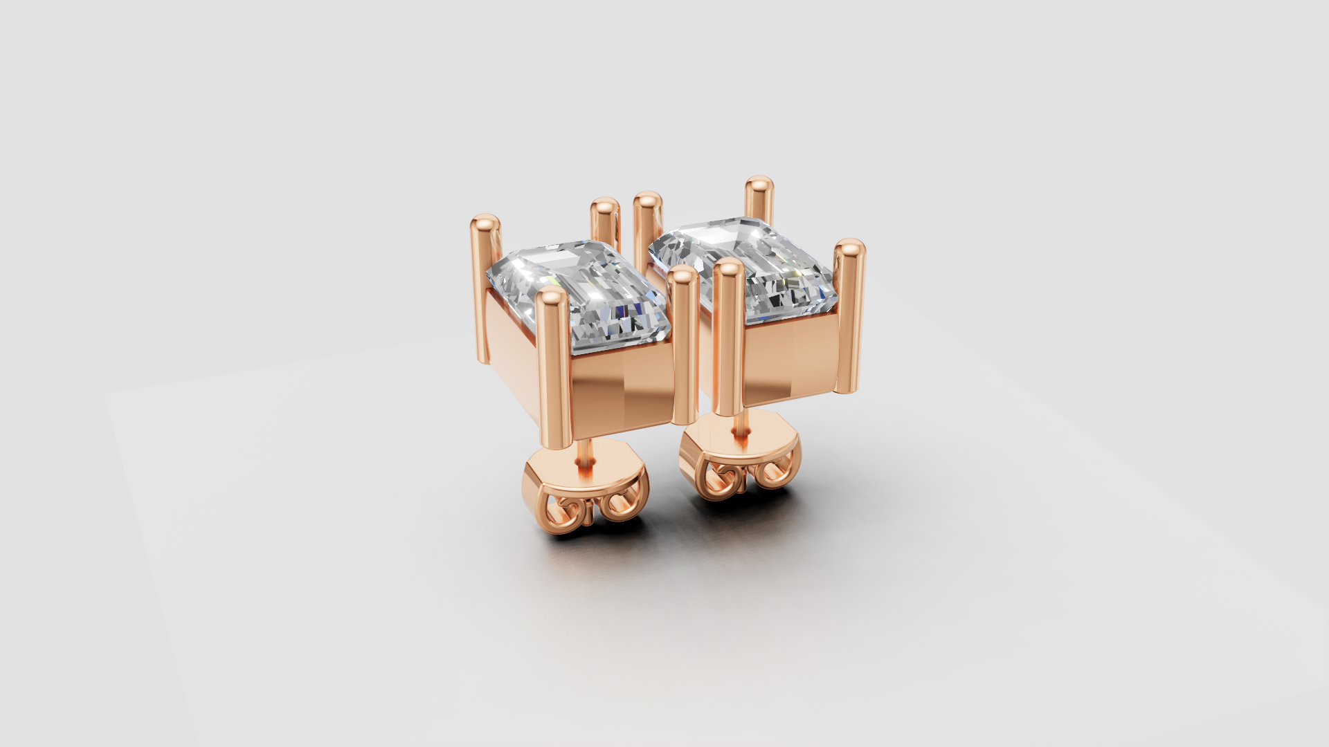 Emerald-Cut 4-Prong Stud Earrings | 18K Gold | DS IMPEX